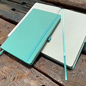 Two turquoise notebooks. 