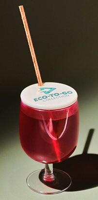 Drink with a drink cover and straw
