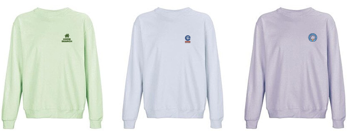 Three pastel colour crewneck sweatshirts in a row. 